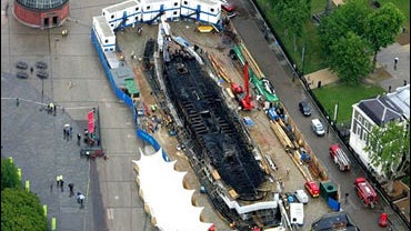 An aerial view of the 19th-century clipper The Cutty Sark after a fire at the ship's dry dock, in Greenwich, east London, Monday May 21, 2007. 