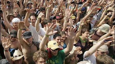The crowd cheers a concert by Damian Marley at the Bonnaroo Music & Arts Festival in Manchester, Tenn., in this June 17, 2006, file photo. 