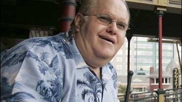 Lou Pearlman poses outside his office's at Church Street Station in Orlando, Fla., on Oct. 27, 2006. Framed posters of teen heartthrobs such as the Backstreet Boys are among the items on the auction block as creditors liquidate the assets of the boy-band  
