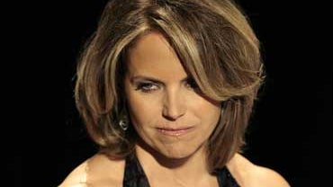 News anchor Katie Couric is photographed at the annual Jackie Robinson Foundation awards dinner in New York, Monday, March 5, 2007. Couric says the move to CBS would have been less appealing if she had known she'd be doing the more traditional "CBS Evenin 