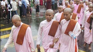 Buddhist nuns march during a protest against the military government in Yangon, Myanmar, 