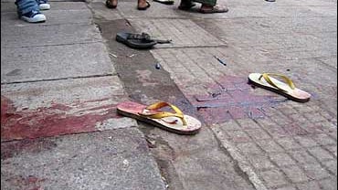 blood-soaked sandals following a shooting by soldiers during a protest in downtown Yangon, Myanmar 