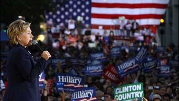 U.S. Senator and presidential hopeful Hillary Clinton,N-NY, speaks to a crowd of over 10,000 at a rally in Oakland, Calif. on Sunday, Sept. 30, 2007. (AP Photo/Jakub Mosur) 