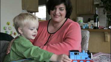 Sheryl Tolson, 45, watches her son, James, 2, play her home in Elk Grove, Calif., Tuesday, Oct. 16, 2007. Republican presidential hopeful shares the lead among conservative voters in the Republican presidential race, despite the New Yorker's three marriag 