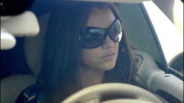 Britney Spears sits in her car before a hearing regarding her ongoing child custody case at the Stanley Mosk Courthouse Oct. 26, 2007, in Los Angeles. (Photo: GETTY IMAGES/Toby Canham) 