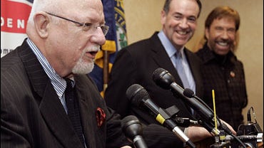 Ed Rollins and Mike Huckabee 