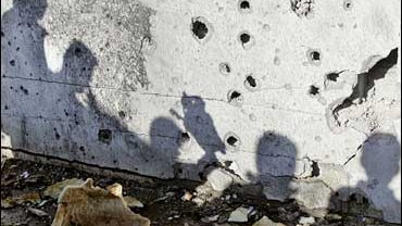 Palestinians cast shadows in central Gaza Strip 