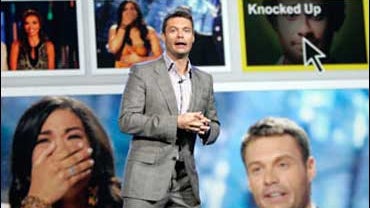 Television and radio personality Ryan Seacrest helps announce new the Comcast product, "Fancast", at the Consumer Electronics Show in Las Vegas, Tuesday, Jan. 8, 2008. 