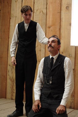 This photo released by Paramount Pictures shows actors Daniel Day-Lewis, right, and Paul Dano in a scene from "There Will Be Blood." 