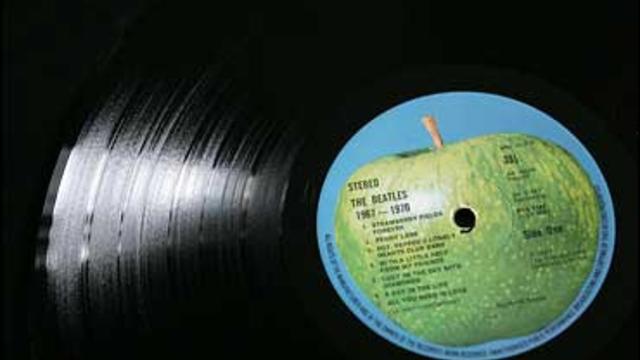 a vinyl record of the Beatles' album "Abbey Road." 