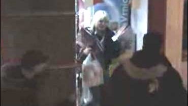 Two women looting during Belgrade riots 