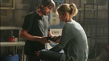 Skeet Ulrich and Ashley Scott in "Jericho" 