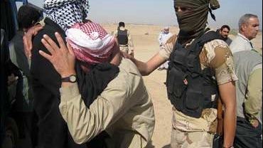 Awakening council members, a Sunni group fighting al-Qaida, grieve for their six comrades who were killed in a US airstrike near Samarra 