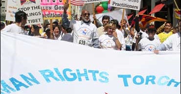 Protesters Hold Human Rights Torch Relay - CBS News