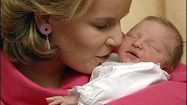 Belgium's Princess Mathilde kisses her newborn daughter Princess Eleonore 