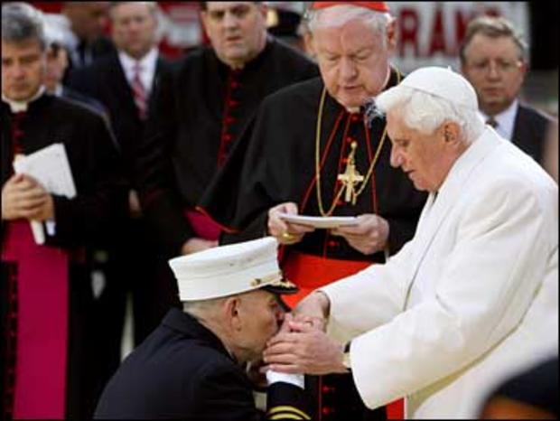NYC New York City Fire Department Chief Salvatore Cassano kisses the hand of Pope Benedict XVI at Ground Zero 