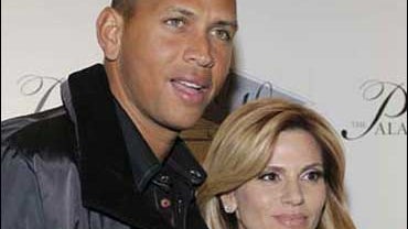 Alex Rodriguez, left, and his wife Cynthia Scurtis arrive at the grand opening of Jay-Z's 40/40 Club at the Palazzo hotel and casino in Las Vegas, Monday, Dec. 31, 2007. (AP Photo/Jae C. Hong) 