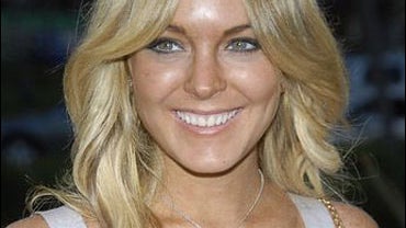 Actress Lindsay Lohan poses on the press line at the LG launch party for its Scarlet line of flat-screen TVs in West Hollywood, Calif., on Monday, April 28, 2008. 