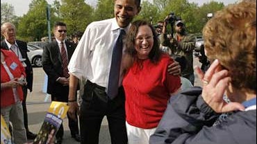 Sen. Barack Obama shares a laugh with voters 