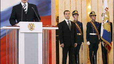 Outgoing Russian President Vladimir Putin, left, looks on at the start of an inauguration ceremony for president-elect Dmitry Medvedev 