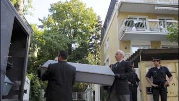 A coffin containing the body of one of the victims of an Austrian man 