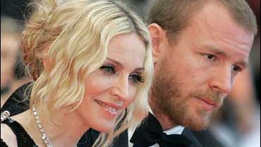 Madonna and husband director Guy Ritchie arrive for the premiere of her film, "I Am Because We Are," at the Cannes Film Festival, on Wednesday, May 21, 2008. 