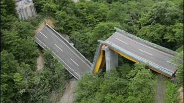 A road bridge lies destroyed in the city of Ichinoseki 