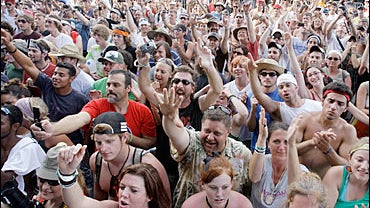 Fans cheer during a B.B. King concert at the Bonnaroo music festival 