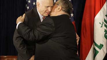Republican presidential candidate, Sen. John McCain, R-Ariz., hugs Iraq President Jalal Talabani 