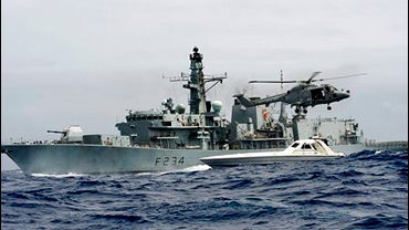 In this photo made available Tuesday July 2, 2008, by the British Ministry of Defence, the ship which Prince William is serving aboard, the HMS Iron Duke intercepts a speedboat northeast of Barbados on Saturday, June 28, 2008, with U.S. Coast Guard offici 