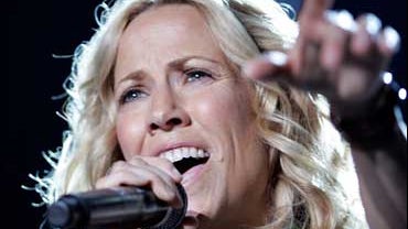 Sheryl Crow performs at the Mann Center for the Performing Arts, in this August 2, 2008 file photo, in Philadelphia. As part of a Rock the Vote voter registration drive, singer-songwriter Crow will give away 50,000 digital copies of her latest album, "Det 
