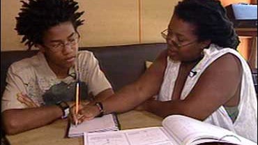 P. Aurora Robinson has home schooled her 14-year-old son Tau. 