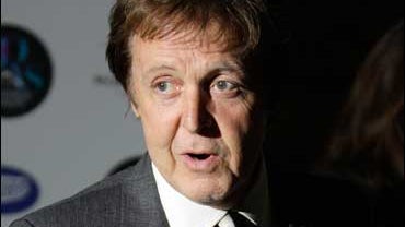 British musician Sir Paul McCartney arrives for the National Magazine Company's 30 Days of Fashion and Beauty viewing of 30 photographs taken by Mary McCartney, which takes place during London Fashion Week, London, Tuesday Sept. 16, 2008. 