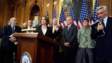 House Speaker Nancy Pelosi, center, with Democratic leaders and economic experts, speaks during a news conference following an economic forum, on Oct. 13, 2008, in Washington. 