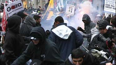 Demonstrators outside the Israeli Embassy in London as they call for the fighting in the Gaza region to stop 