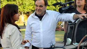 Argentine President Cristina Fernandez and filmmaker Oliver Stone 