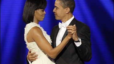 President Barack Obama and Michelle Obama dance together at the Neighborhood Inaugural Ball in Washington 