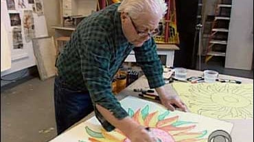 Artist Red Grooms creates a sun logo sculpture for "Sunday Morning." 