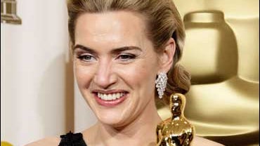 British actress Kate Winslet holds the Oscar for best actress for her work in "The Reader" during the 81st Academy Awards Sunday, Feb. 22, 2009, in the Hollywood section of Los Angeles. 