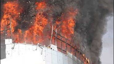 Flames rise out of the burning Bashundhara City mall in Dhaka, Bangladesh 