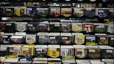Dozens of music recordings are seen at Bull Moose record store in Portland, Maine, on Thursday, April 16, 2009. 