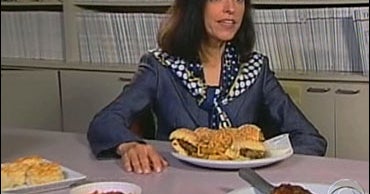 Hockey Puck Hits Fan CBS News