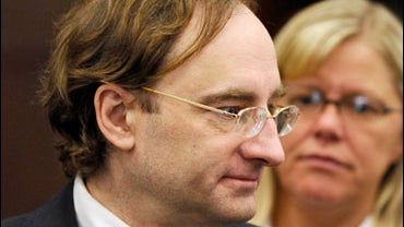 Christian Karl Gerhartsreiter, who calls himself Clark Rockefeller, enters the courtroom for his kidnapping trial in Suffolk Superior Court in Boston on Thursday, June 4, 2009. Gerhartsreiter, originally from Germany, is charged with kidnapping his 7-year 