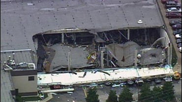 The roof of a ConAgra Foods plant in Garner, N.C., collapsed following an explosion Tuesday, June 9, 2009. 