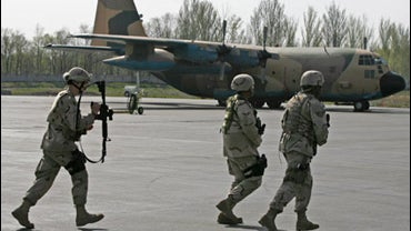 U.S. soldiers patrol the air base during American-French joint exercises at the U.S. Manas Air Base, located near the Kyrgyz capital of Bishkek 