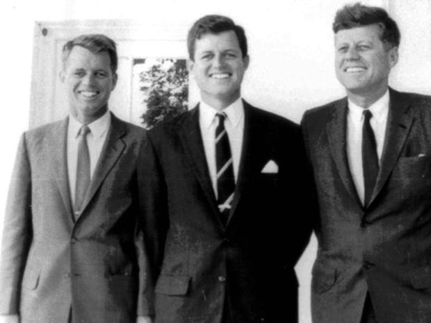 President Kennedy and his brothers, Attorney General Robert F. Kennedy and Senator Edward M. Kennedy. White House, outside Oval Office. Aug. 28, 1963. 