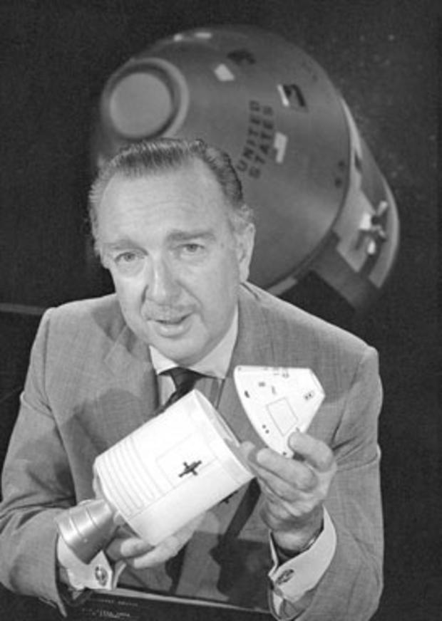 CBS News anchor Walter Cronkite uses a model to help explain NASA's Apollo 7 mission during his coverage of the mission from North American Rockwell Space Center, Houston, Texas, October 21, 1968. (Photo by CBS Photo Archive) 