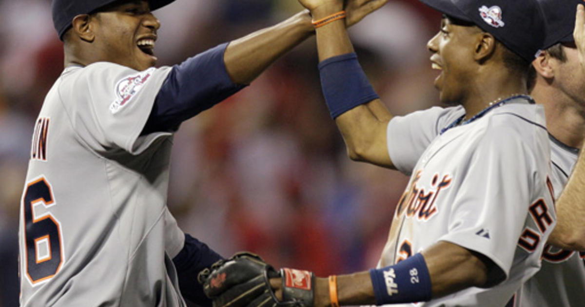 American League's Adam Jones of the Baltimore Orioles hits a sacrifice fly  to score Curtis Granderson of the Detroit Tigers during the eighth inning  of the MLB All-Star baseball game in St.