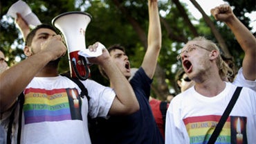 Members of the gay community protest near the sit of a shooting attack in Tel Aviv, Israel, Sunday, Aug. 2, 2009. 