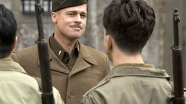 In this film publicity image released by The Weinstein Co., Brad Pitt is shown in a scene from, "Inglourious Basterds." 